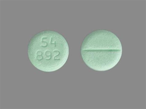 What are the possible side effects of <b>Roxicodone</b>? <b>Roxicodone</b> may cause serious side effects including:. . Small round green pill 54 892